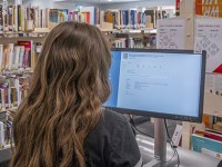 Library: Student Searching Computer 1