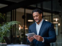 Business Man on Tablet