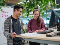 Young Adults at Computer